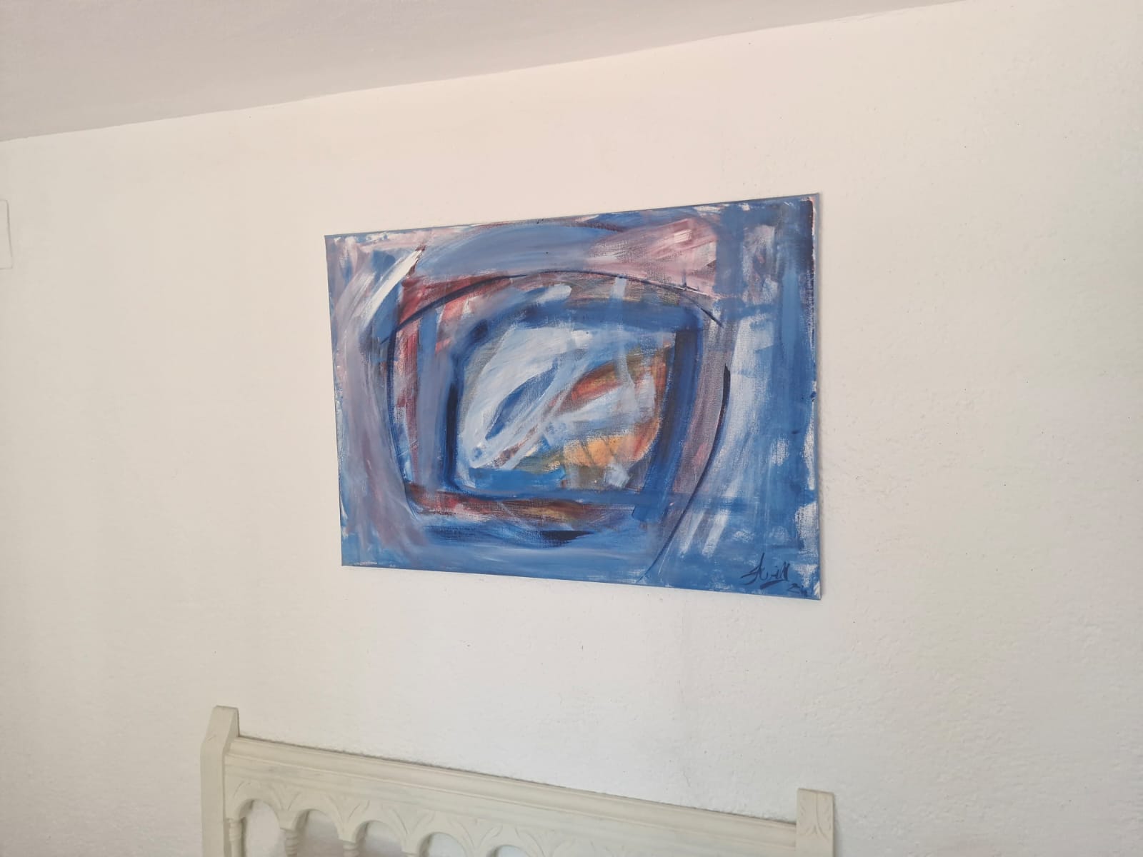Abstract blue painting on wall